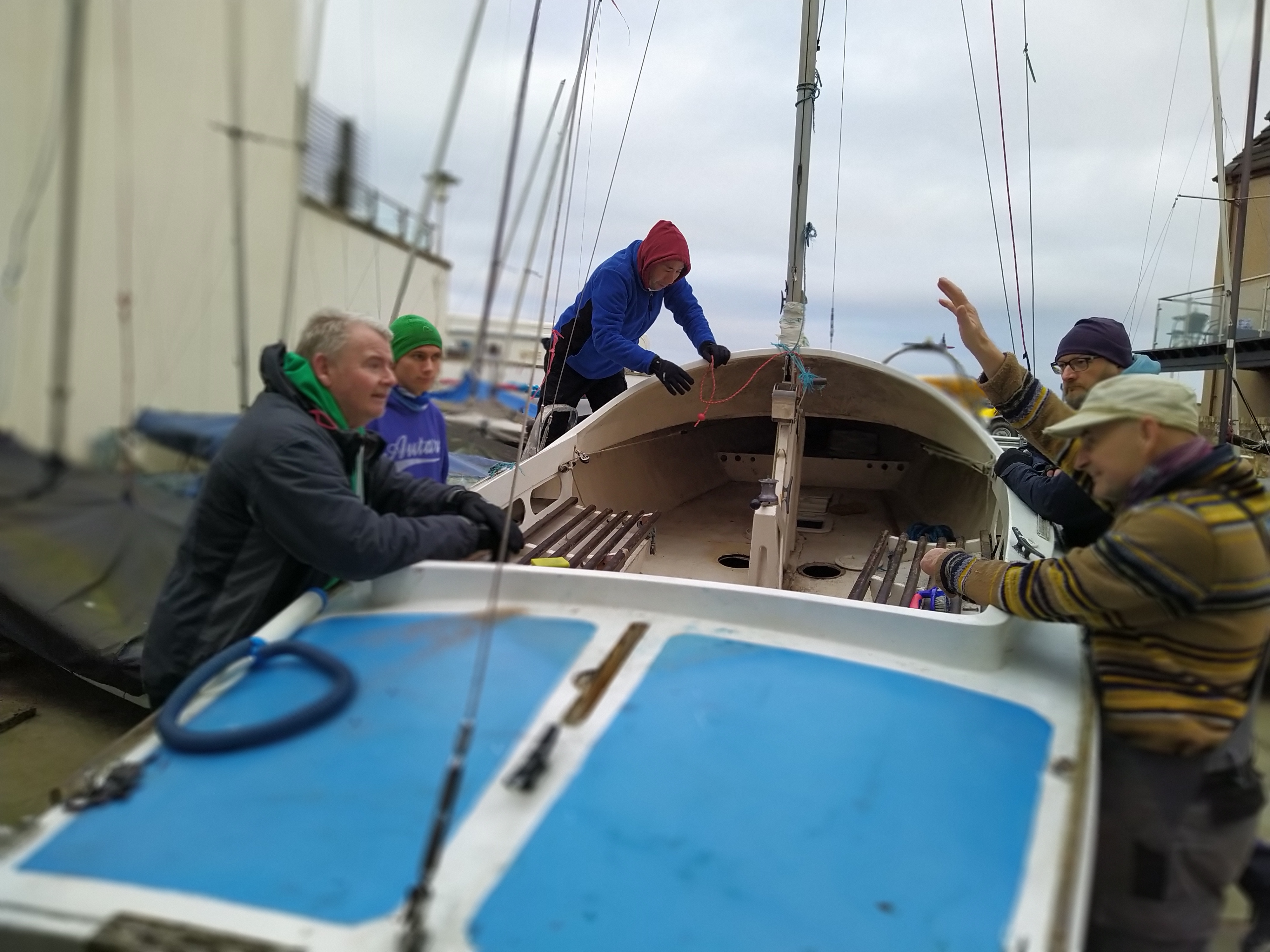 Caption: Looking into what needs to be done on “Wee Mo” Left to right: Max Blinkhorn, Chris Jagau, Will Wong, Simon Blakely, Stuart MacDonald. Photo by: Inez Visser